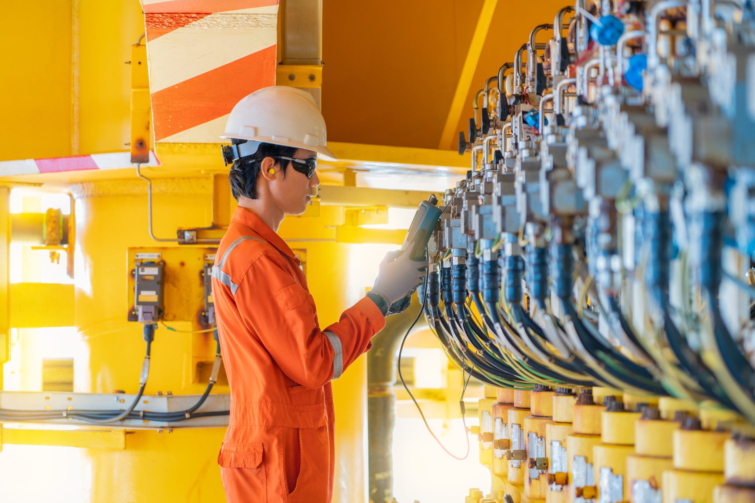 Sealants Image 2 offshore rig worker checking valve positioner dreamstime_l_162901960